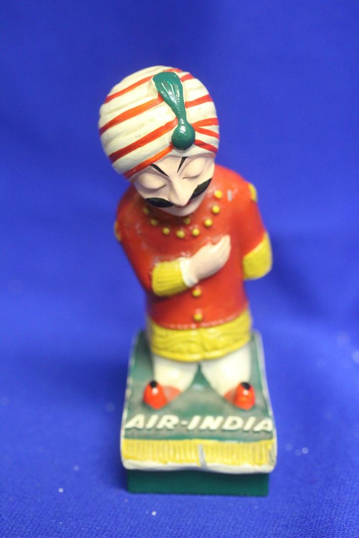 A Vintage Small Air India Figurine: please note: missing hand - 4 3/4" tall