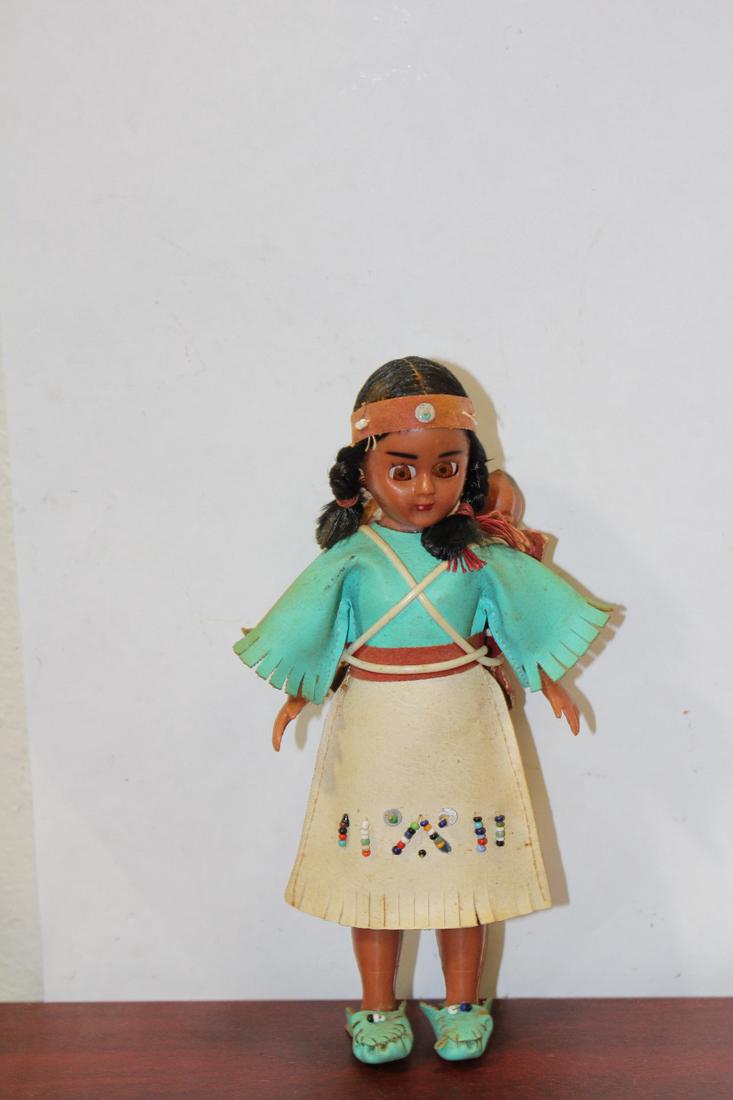 A Vintage Indian Plastic Doll: please note: doll does not stand by itself, must lean against something - 7" tall