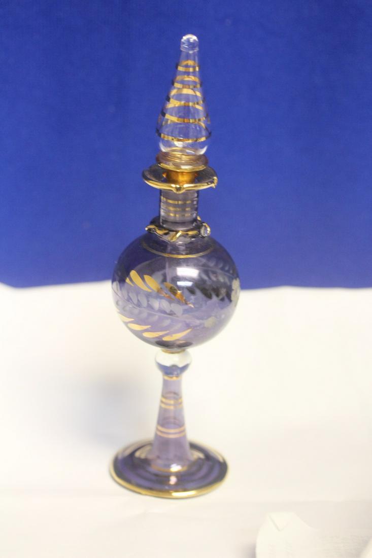 A Glass Perfume Bottle: 6" tall