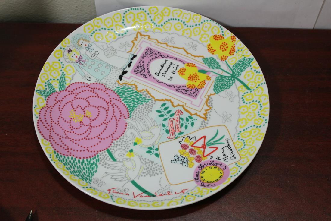 A Signed Ceramic Plate: signed by Gloria Vanderbilt - 10 1/2" in diameter