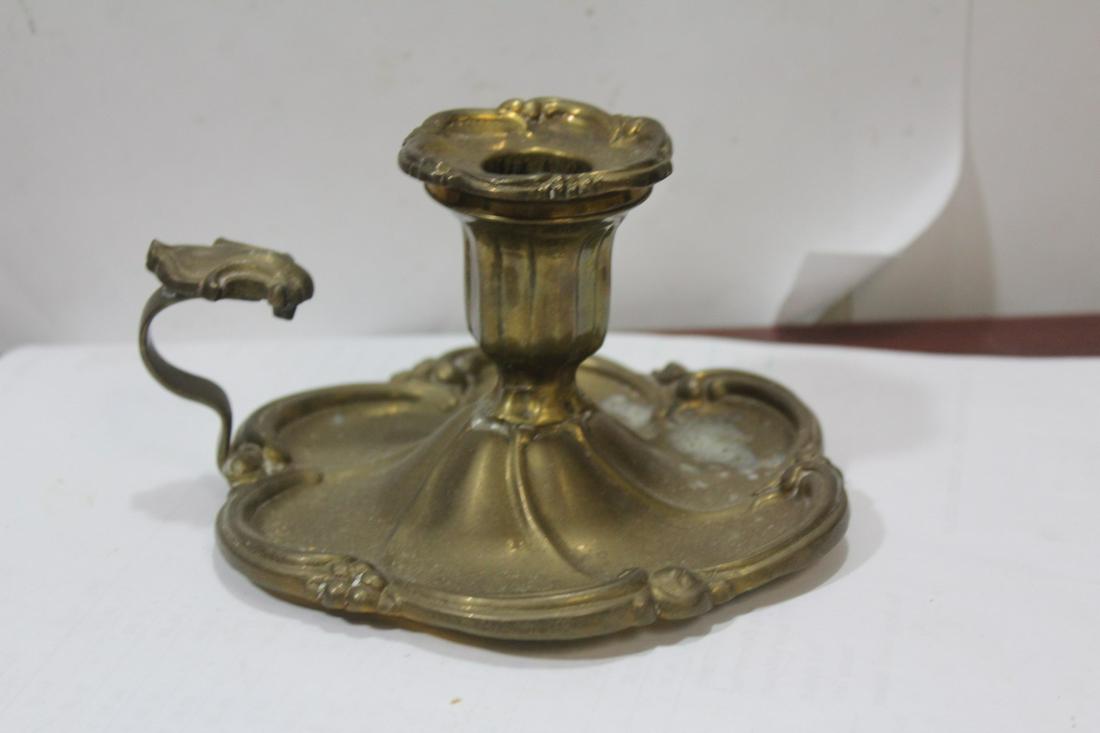 A Brass or Bronze Candle holder: Signed: Mottahedeh - 5 1/2" in diameter