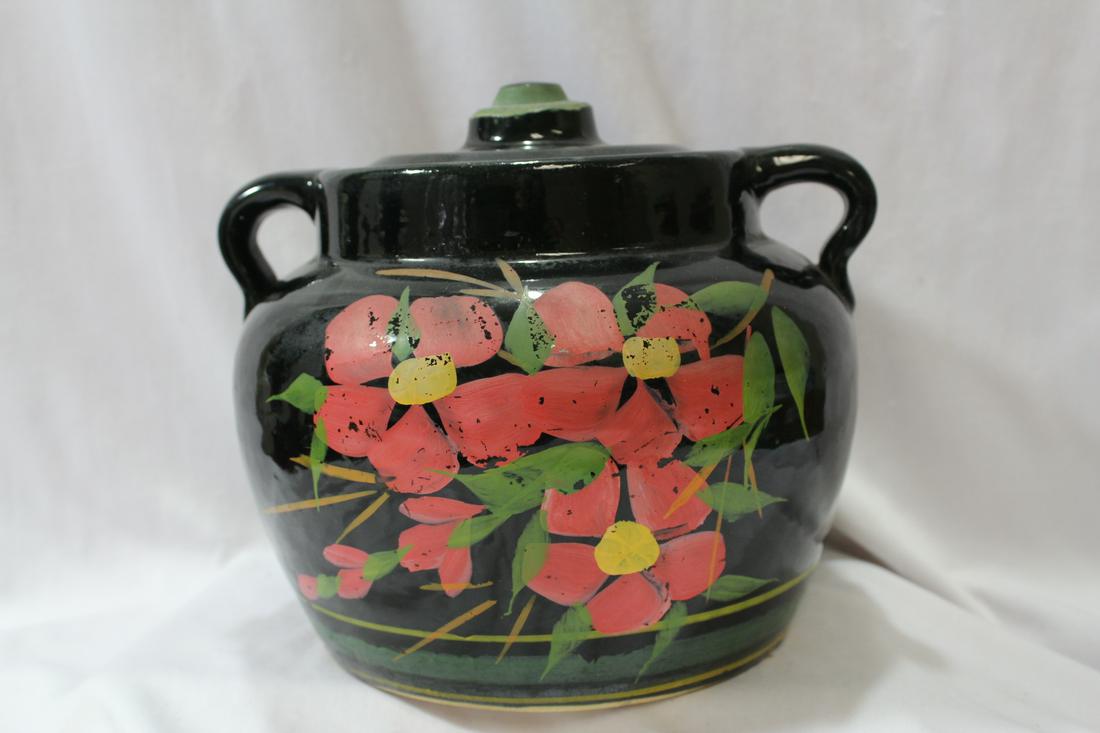 A Cookie Jar: please note: one underchip on the lid as shown - approximately 9" wide