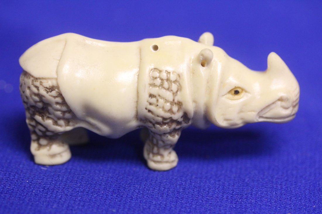 A Resin Rhino Netsuke: 2 3/4" across