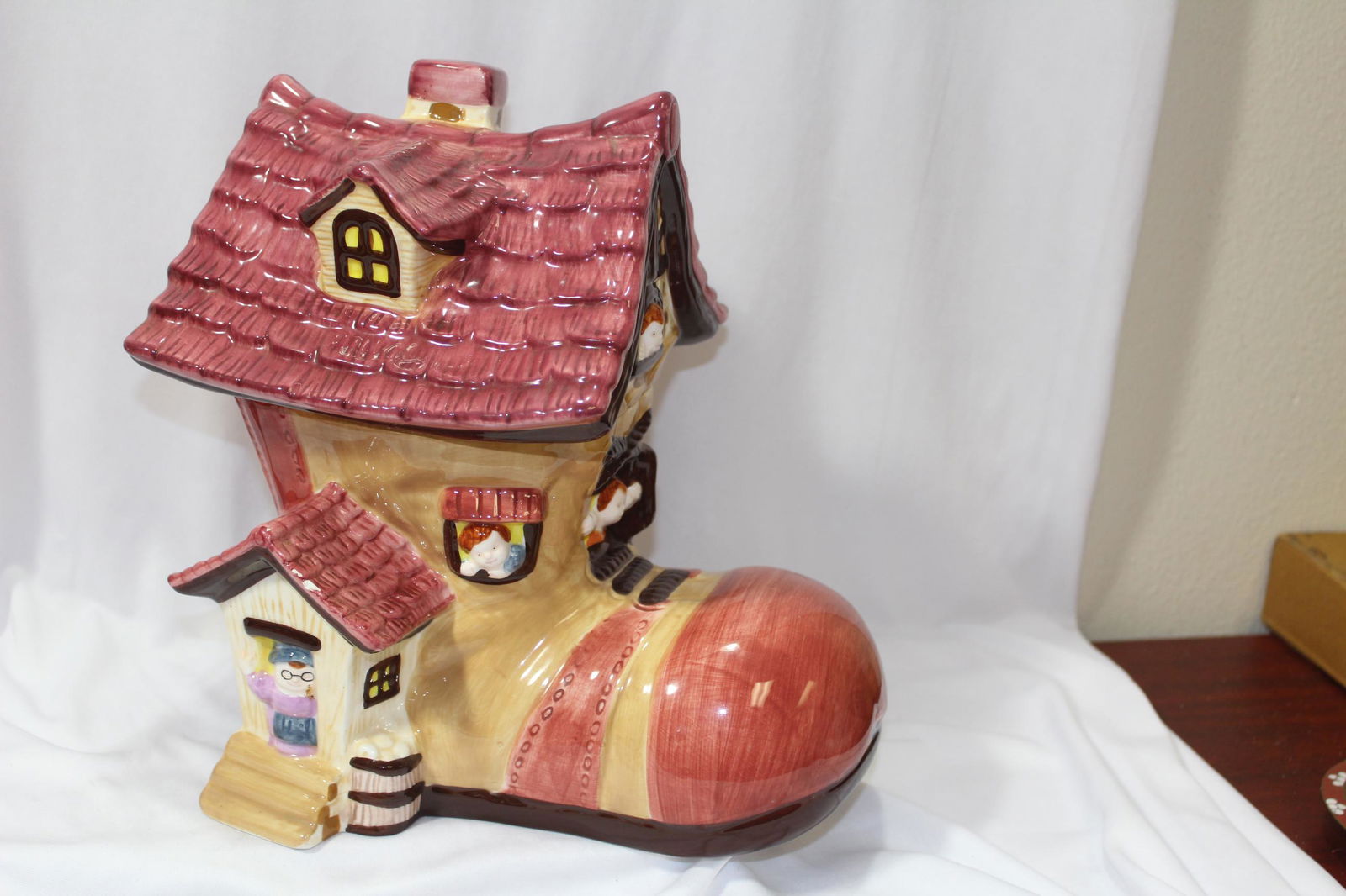 A Shoe Form Ceramic Cookie Jar: 10 1/2" tall