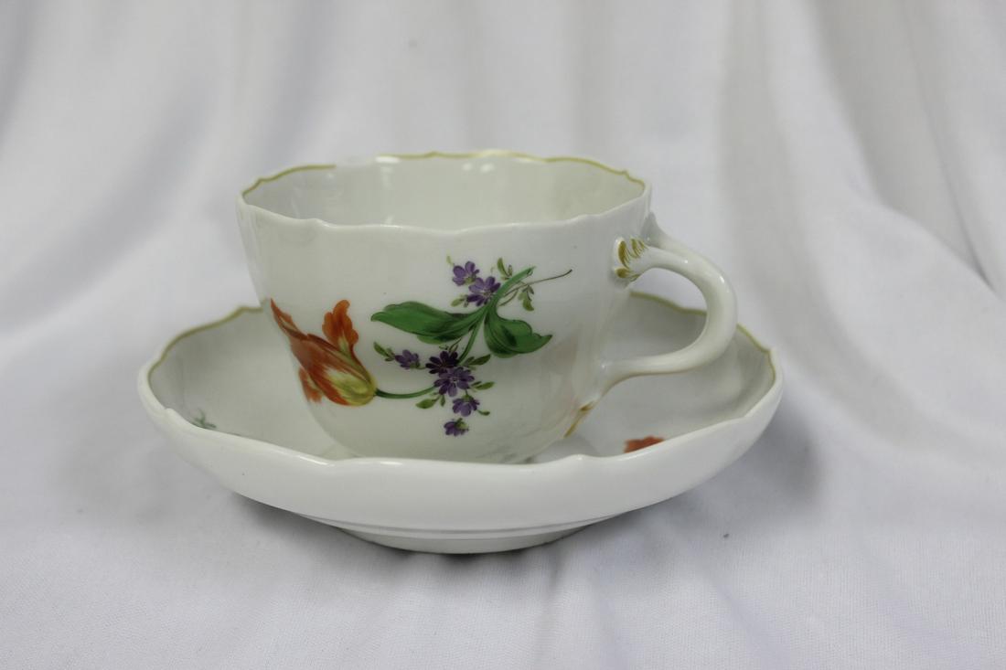 A Meissen Cup And Saucer: note: chip on the cup - saucer= 5 1/2" in diameter