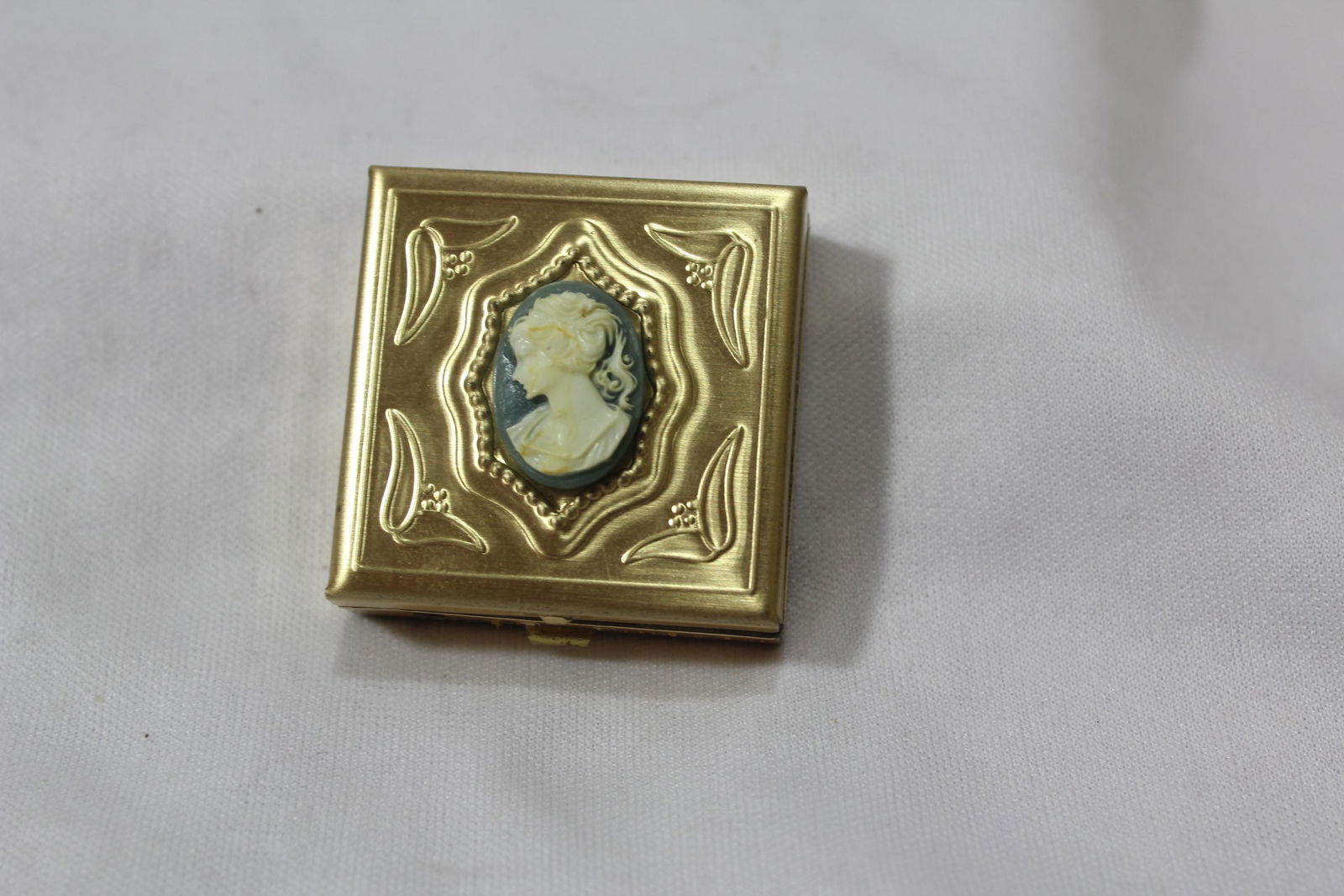 A Cameo Pill Box: 1 3/8" square