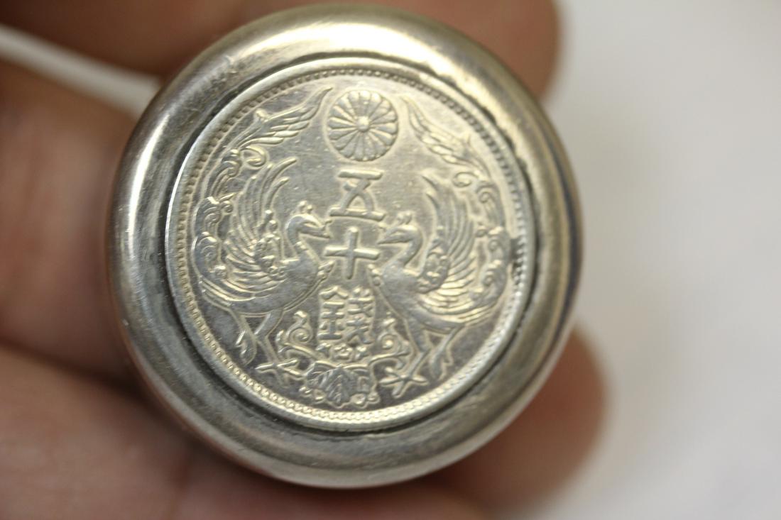 An Imperial Japan Sterling Pill Box: 950 sterling - inside a wooden box - 1 1/8" in diameter