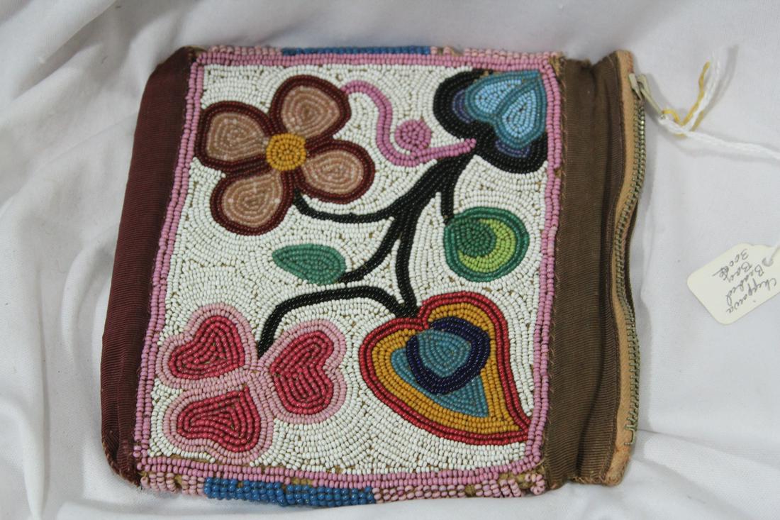 A Vintage Native American Beaded Leather Bag: please note: worn, minor loss - 6" x 6" - Chippowa tribe