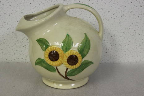 A Shawnee Pottery Flower Pot: please note: minor restoration - 8 inches tall