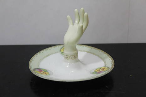 A Porcelain Ring Holder: marked - 3 inches tall