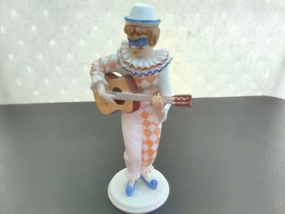 A Kaiser Polychrome Bisque Porcelain Harlequin Figurine With Guitar: Limited edition - 7 1/4 inches tall