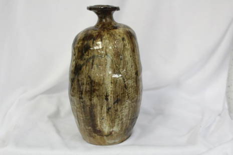 A Signed Clay Bottle: 8" tall