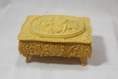 A Celluloid Jewelry Box: Nicely carved - 5 inches across