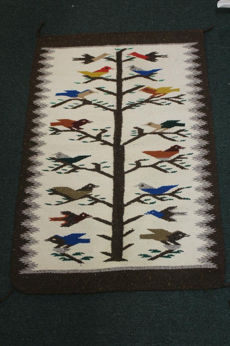A Native American Rug: please note: stain - 39" x 26 1/4"