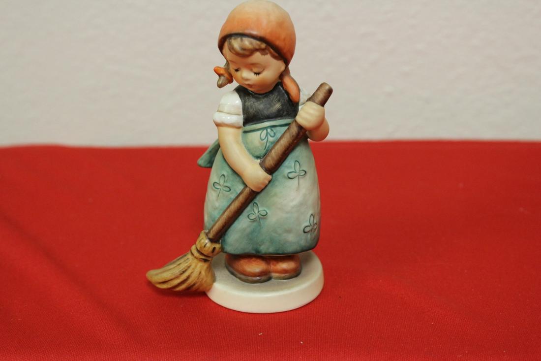 A Hummel Figurine: 5" tall