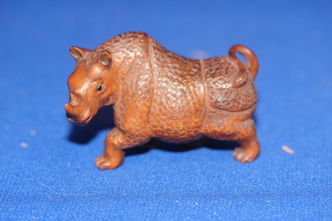 Signed Wooden Japanese Netsuke in form of a Rhino: glass eyes - 2 inches across