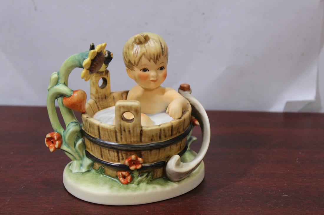 A Hummel Figurine: boxed - 4" tall - artist signed