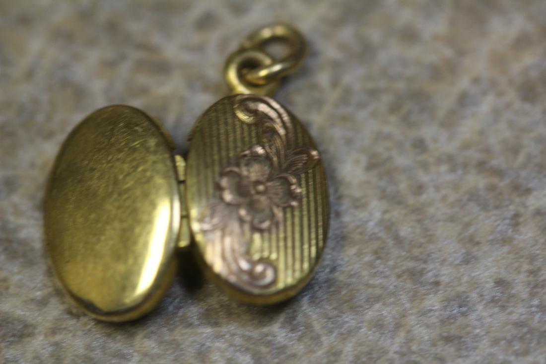 Tiny Gold Filled Locket: as shown