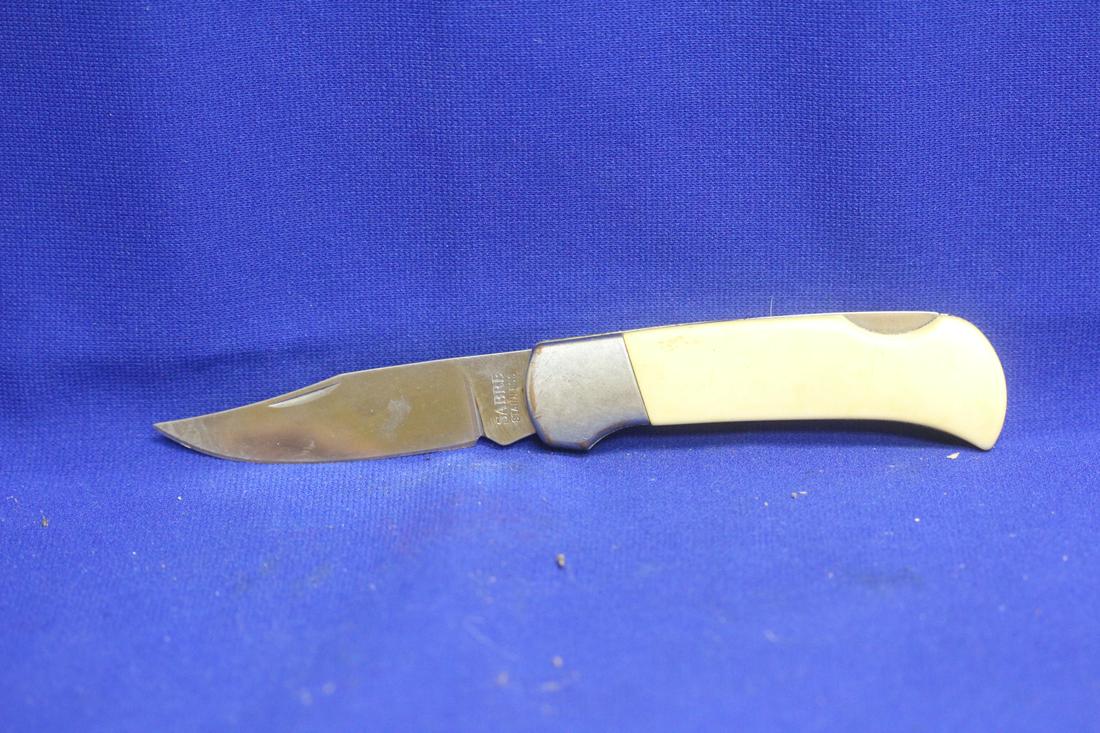 Sabre Pocket Knife: 4" long when folded