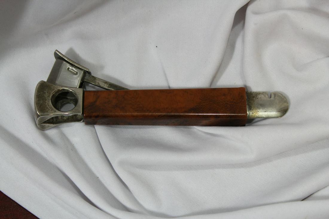 A Possibly Dunhill Cigar Cutter: 6" across