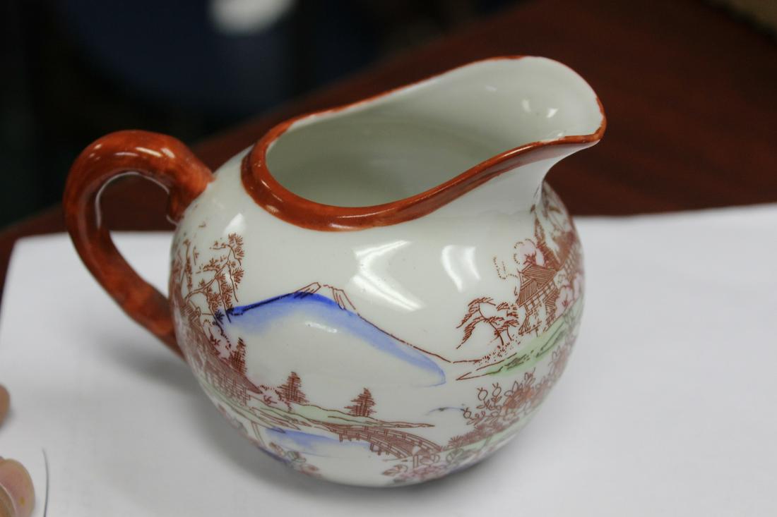 A Kutani Creamer: 4" long