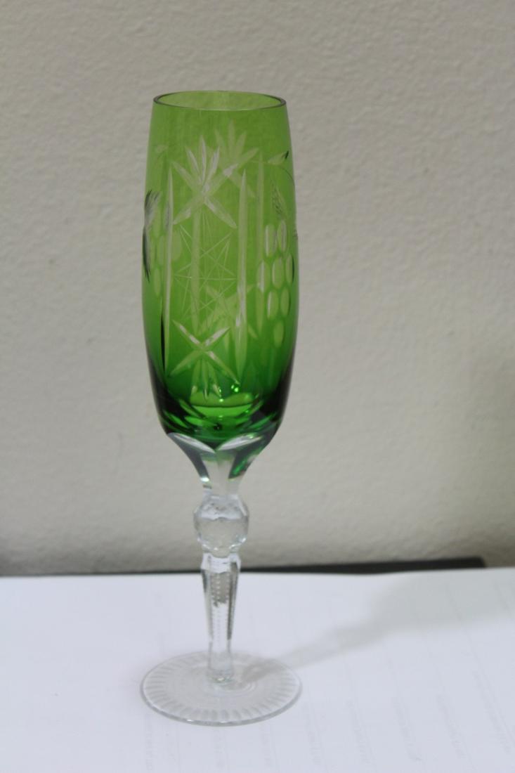 An Etched Green Glass Goblet: please note: one fleabite as shown - 9" tall