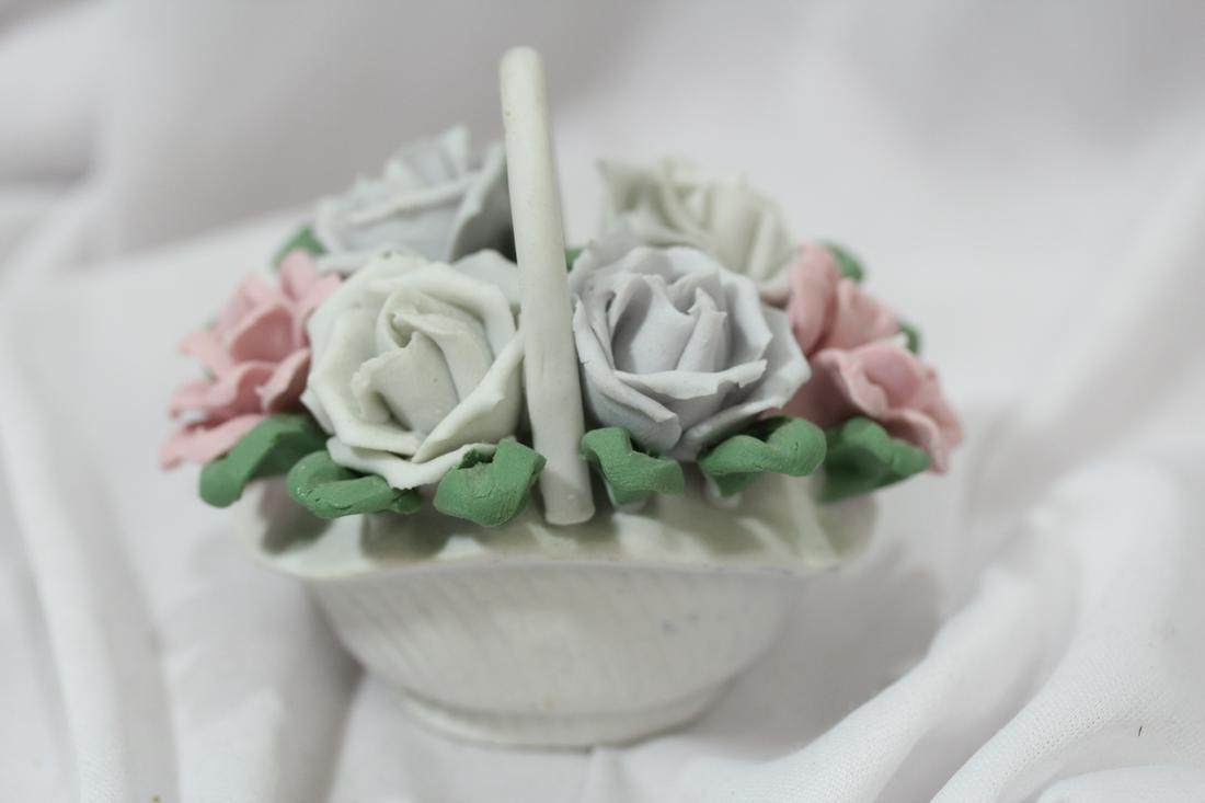A Ceramic Floral Basket: 3 1/4" wide