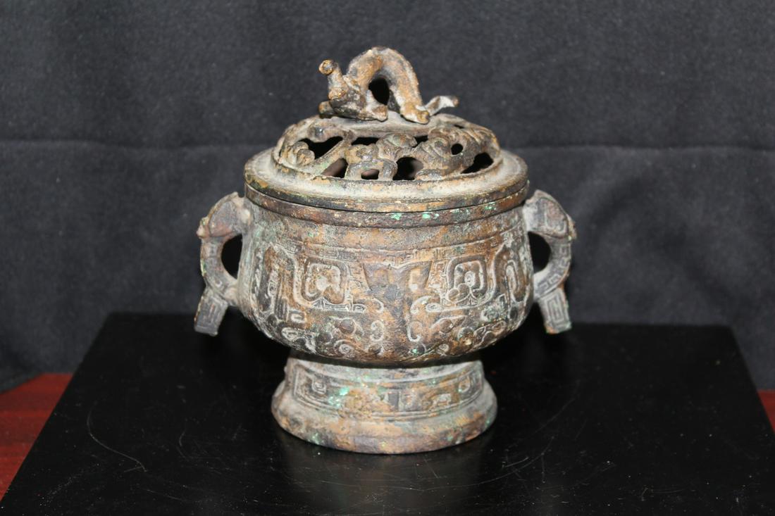 A vintage Cast Iron Japanese Incense Burner: marked Japan underneath - possibly old, but exact age is unknown - 6 1/4" tall