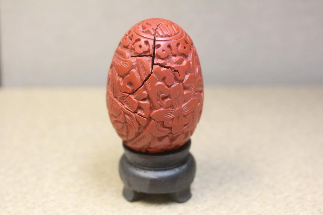 Chinese Cinnabar-Style Egg on Stand: please note: crack - 2 3/8" long without the stand