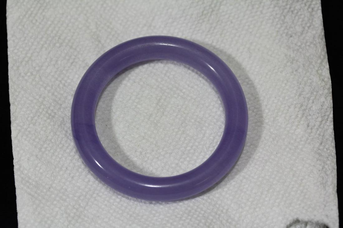 A Lavender Jade or Jadeite Bangle Bracelet: inside diameter= 2 1/4"