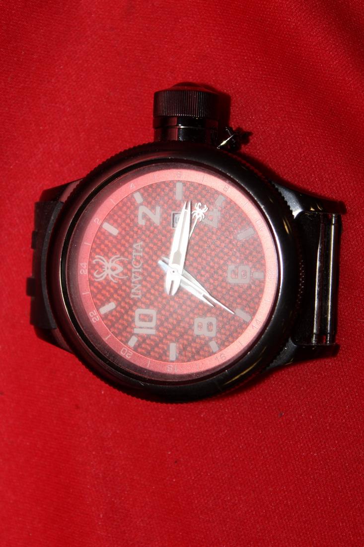 An Invicta Watch: needs new band - currently working, but cannot guarantee to work when it arrives