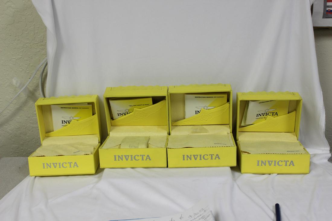 Empty Invicta Boxes: lot of 4 - all the same sizes - measures: 5 3/4" x 4 1/2" x 3 3/4" - all have some sort of paperwork inside - please note: no watches inside!