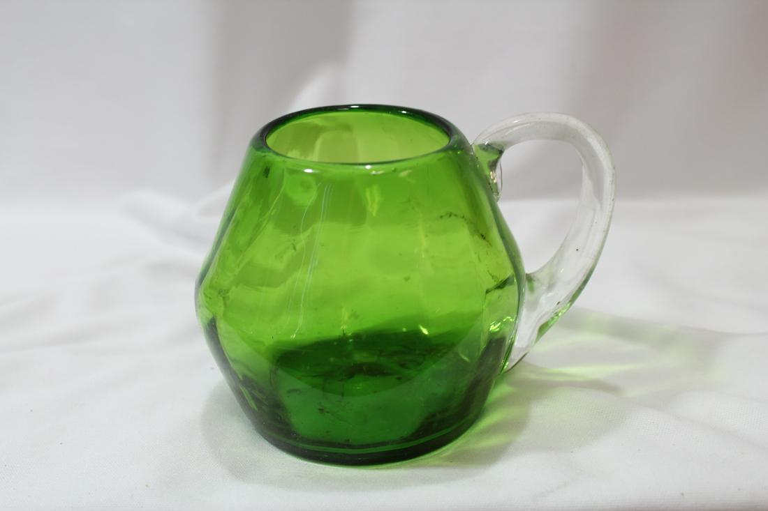 A Green Glass Cup: 3 1/2" tall