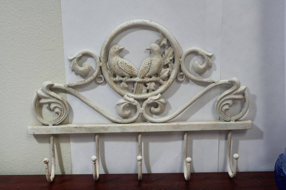 A Metal or Cast Iron Cloth Hanger: 16 1/8" long