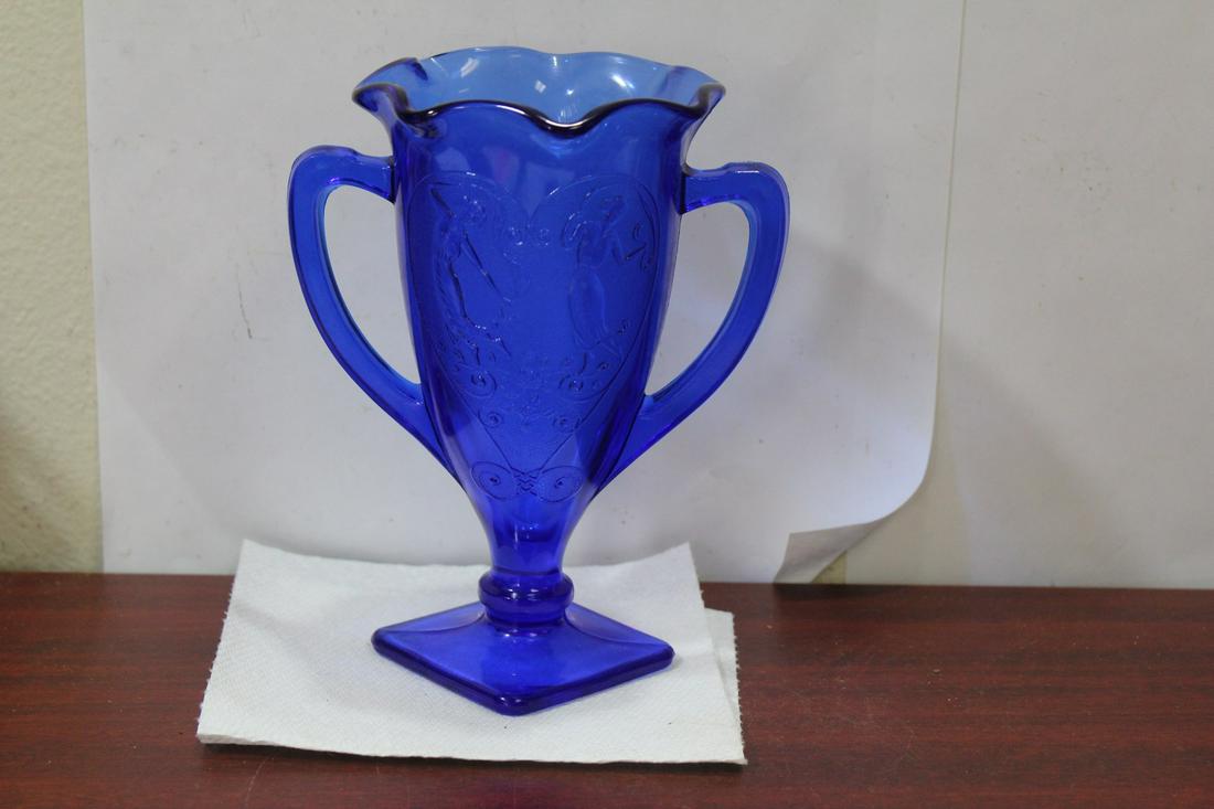 A Cobalt Blue Glass Cup: 7" tall