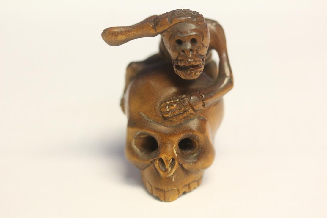 Japanese Netsuke: signed Japanese wooden meMento mori skull netsuke - 1 5/8" tall