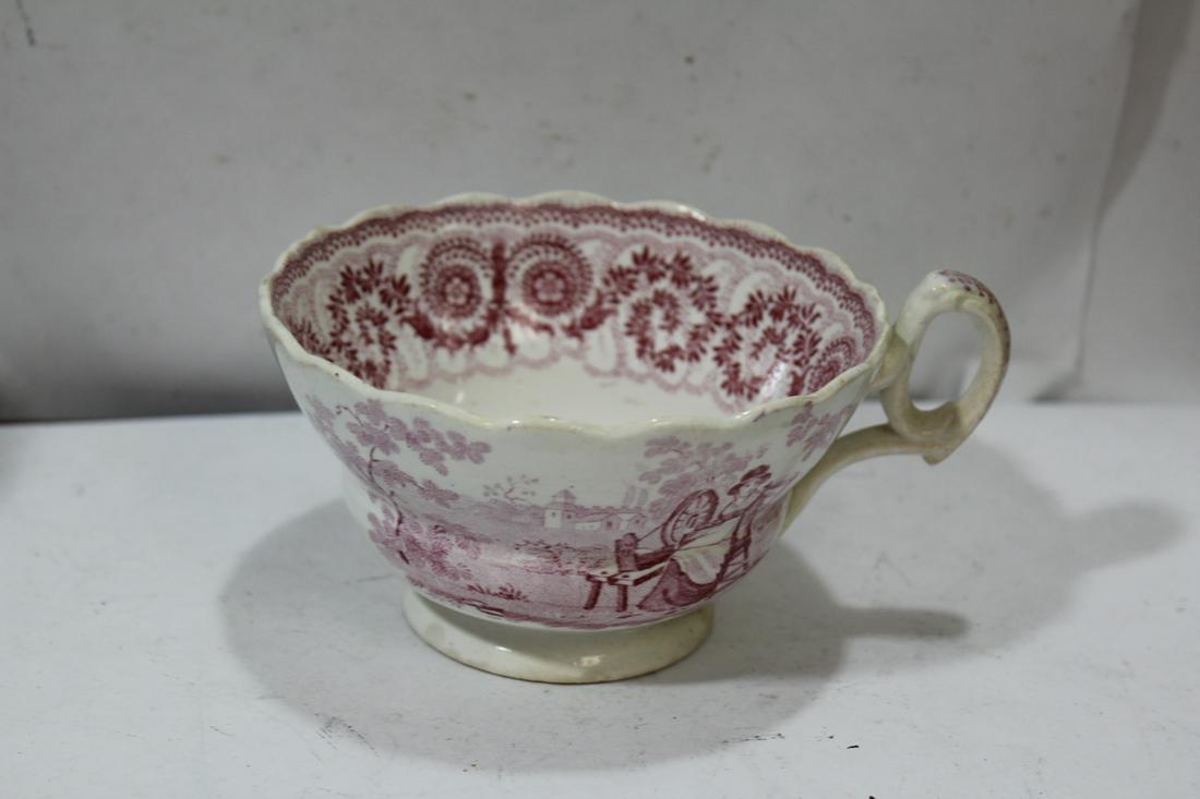 An Antique Ceramic Transferware Cup: 4 1/2" in diameter - please note: bottom rim chip