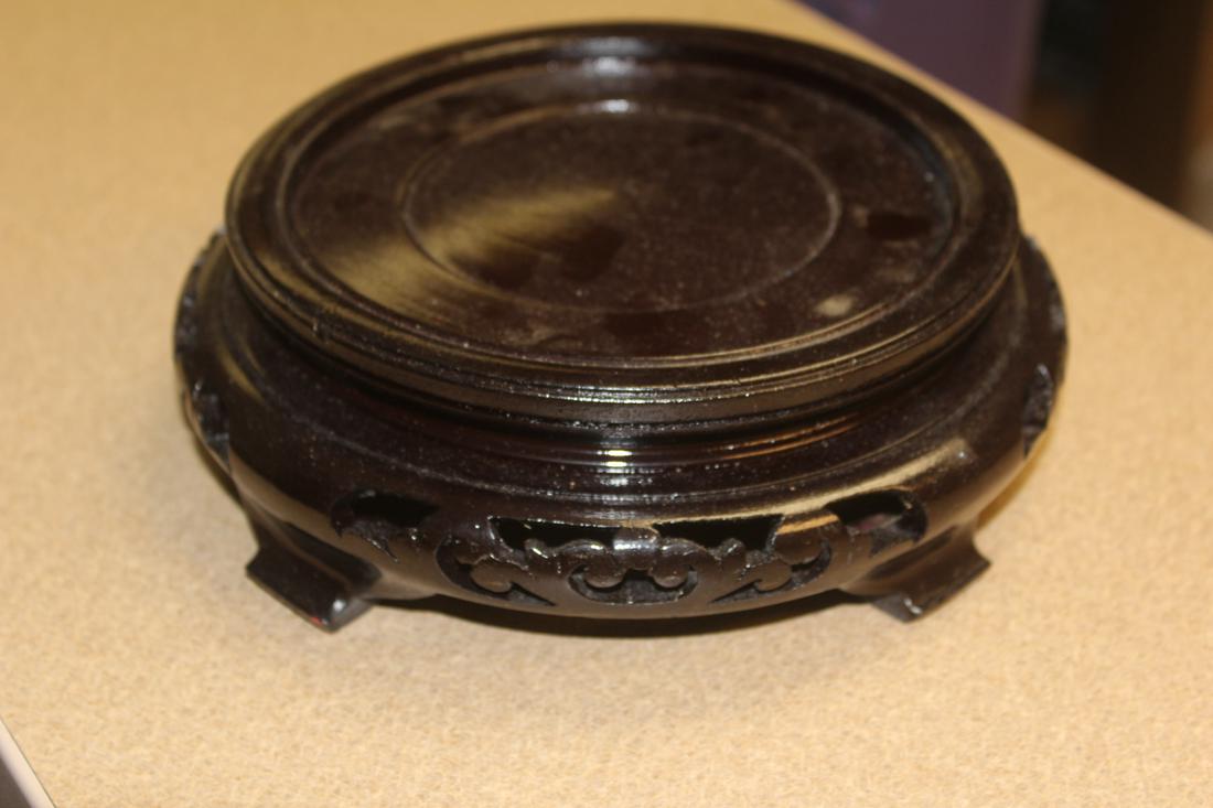 Chinese wooden vase stand: nicely carved, inside diameter 5 5/8"
