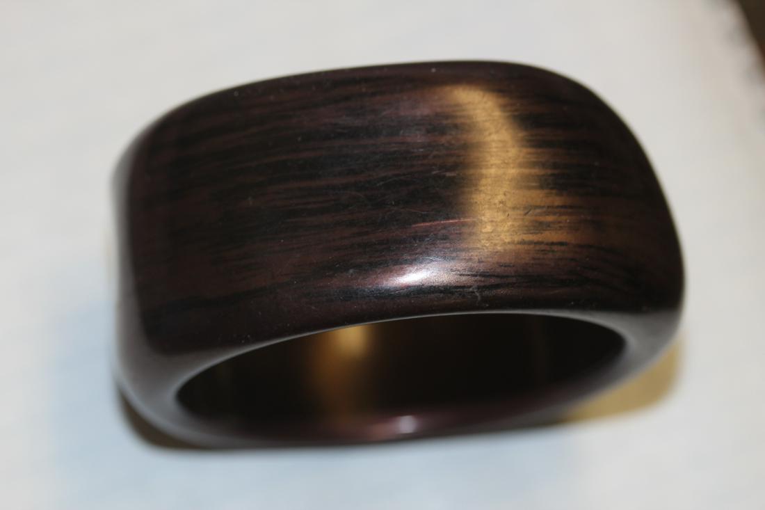 A Vintage or Retro Bangle Bracelet: plastic or lucite - inside diameter: 2 1/2"