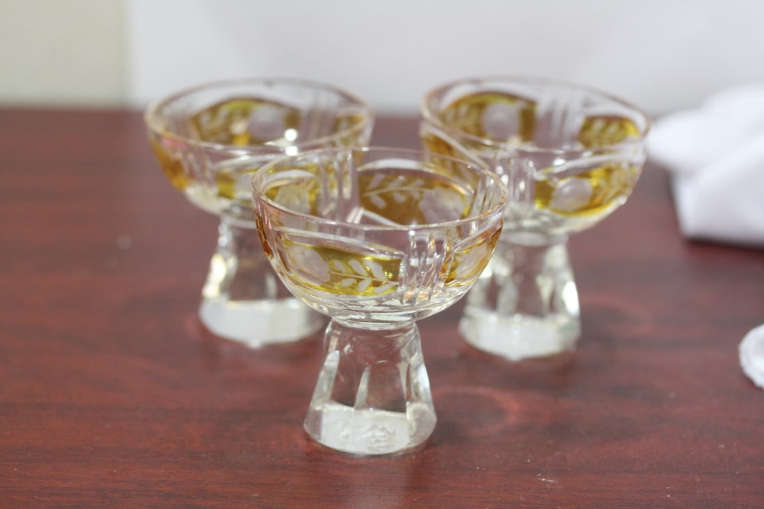 Lot of 3 Cut Glass Shot Glasses: please note: all have chips / roughness - for decoration purposes only - tallest= 2 1/2" tall