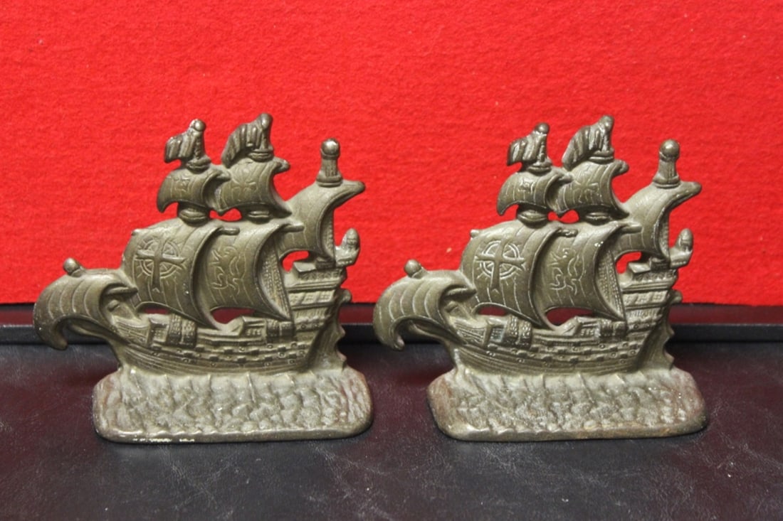 Pair of Cast Iron Bookends: Signed: Galleon Pirate - 5 inches long - looks to be metal
