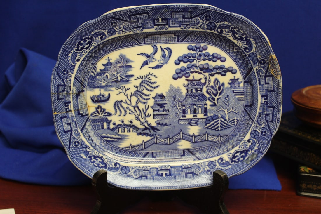 A Blue and White Tray: made in England - please note: restored - 19th century - flow blue - 9 1/2" across