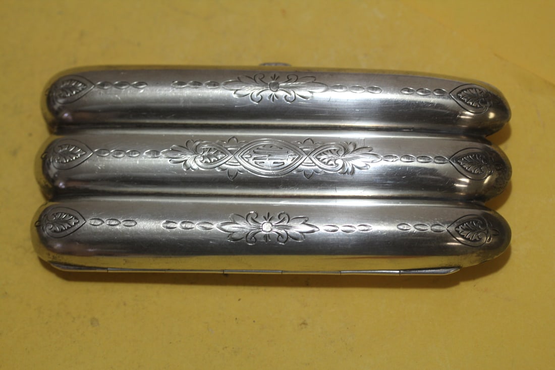 A Sterling Cigar Case: marked sterling 84 - possibly Russian - 5 inches across