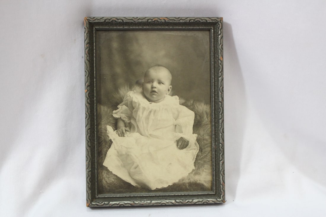 A Vintage Black and White Photograph of a Baby Girl: framed - overall= 6" x 4 1/2"