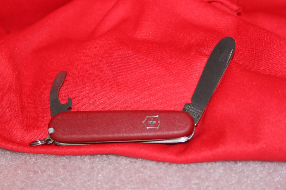 A Swiss Army Knife: Rostfrei - 3 1/4" long when folded