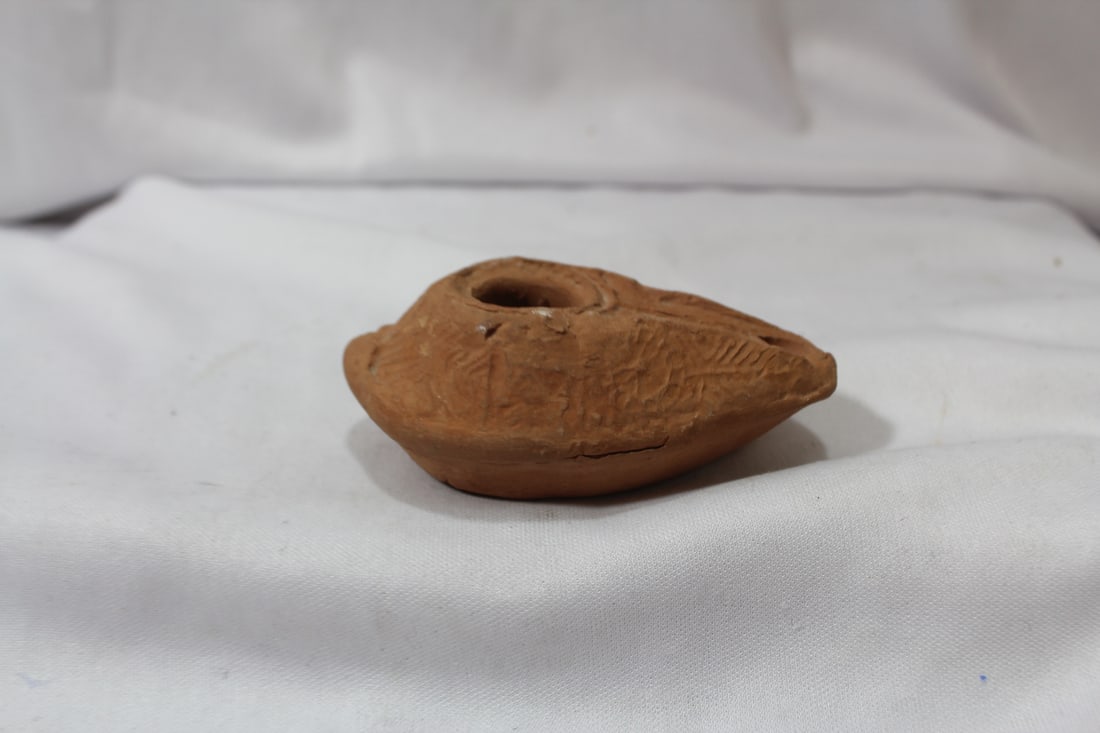 A Roman Clay Oil Lamp: not sure if it is old or not - Roman artifact - 3 1/4" long