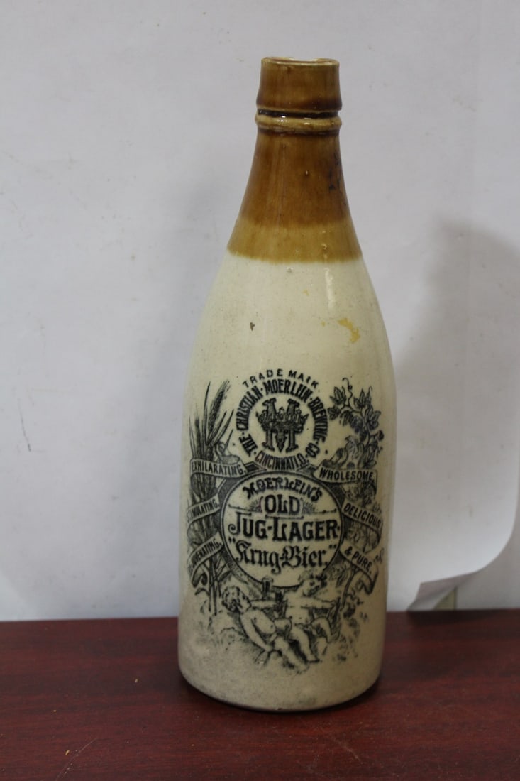 An Antique Jug-Lager Bottle: 19th century - please note= chips on top - 10 3/8" tall