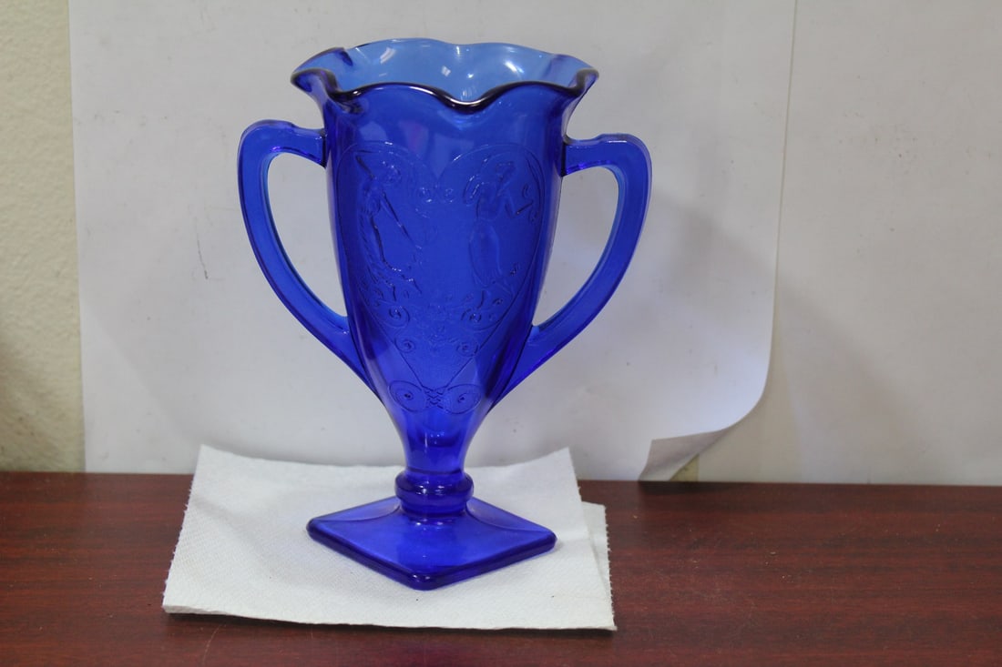 A Cobalt Blue Glass Cup: 7" tall