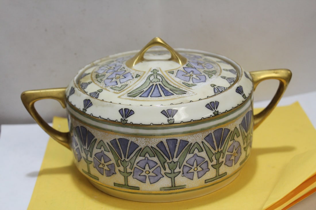 A Hutchenreuther Taureen: Please note: interior chip, not noticeable when lidded - handle to handle measures 9 1/4" in diameter