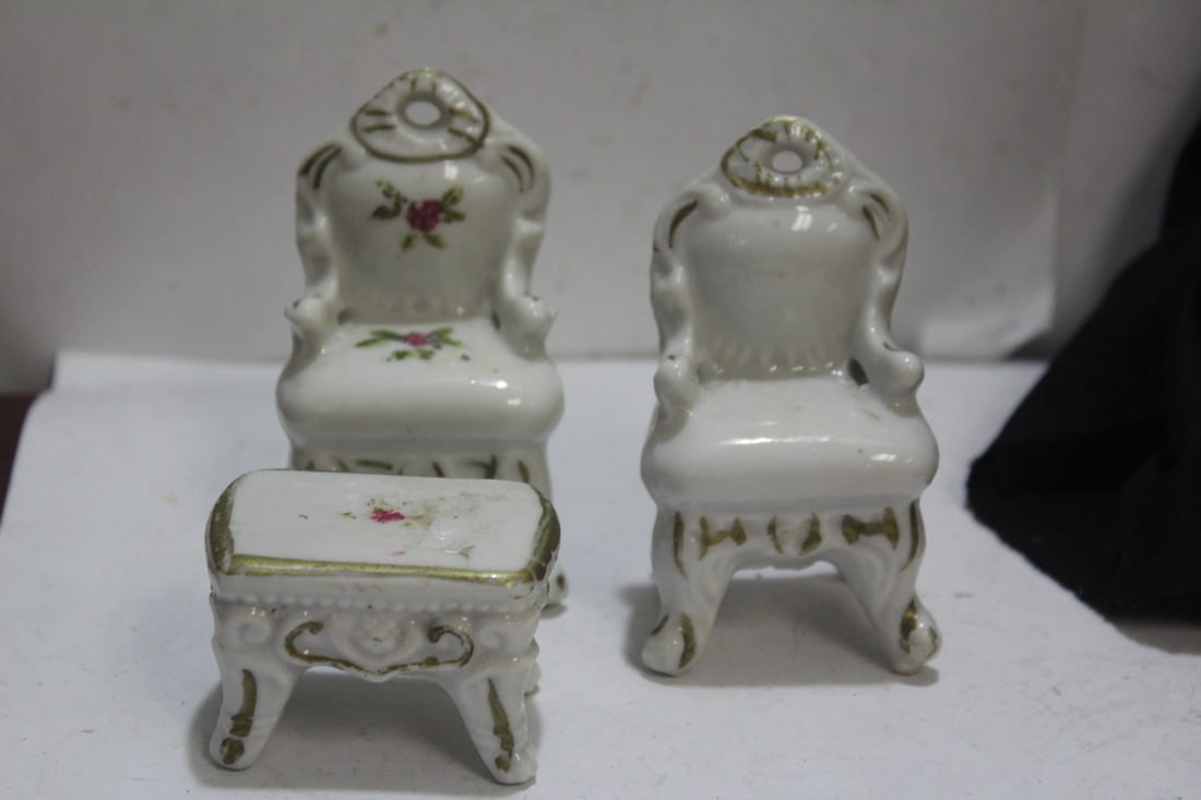 A Porcelain Miniature Furniture Suite: lot of 3 - includes 2 sofas and a table - tallest= 3 3/4"